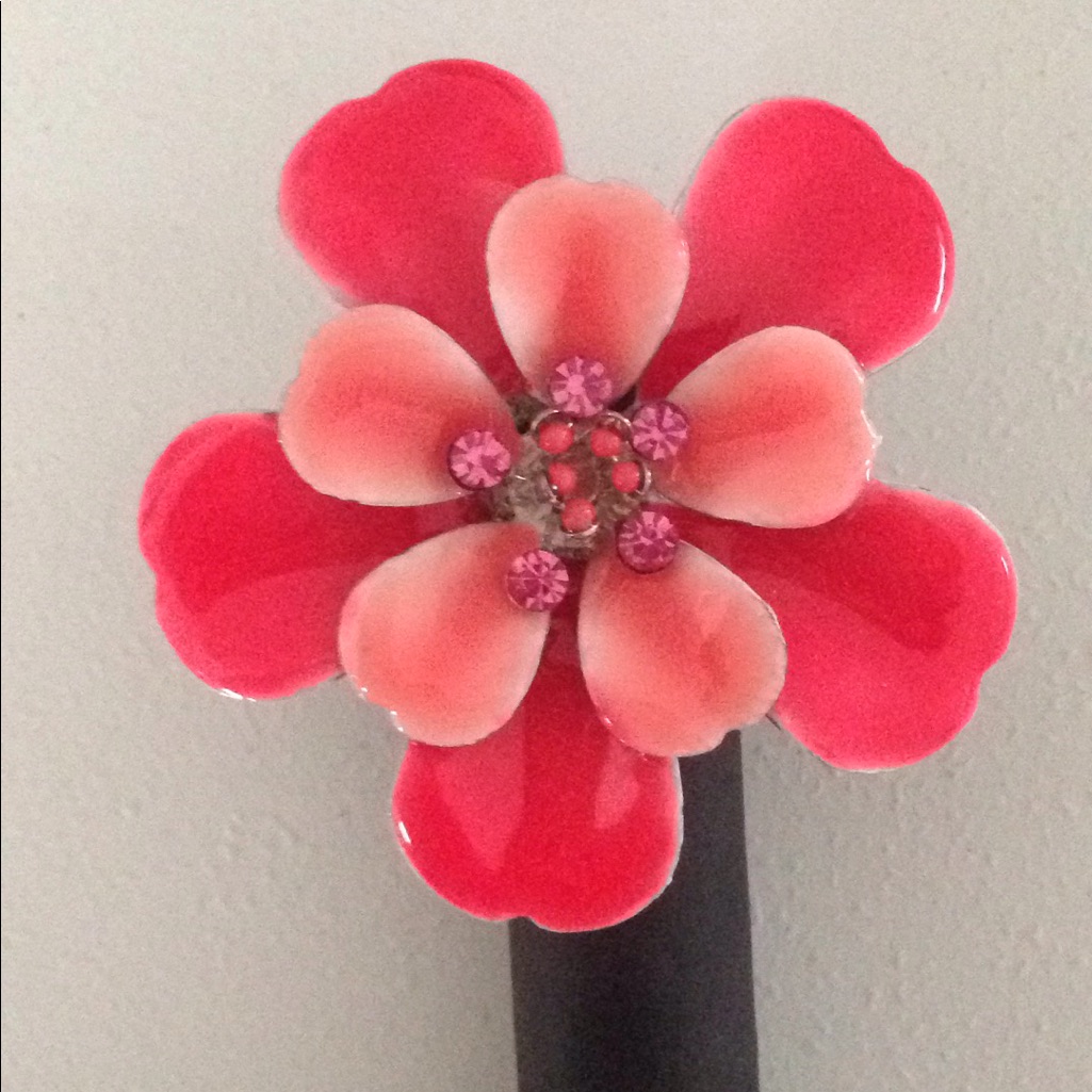 Ring With A 2 Inch Coral Flower With Crystals